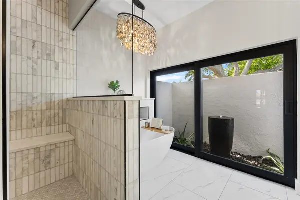 Primary Spa Bathroom and Chandelier