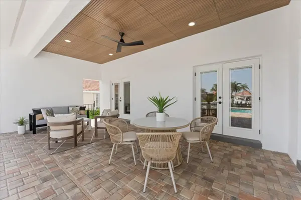 Waterfront Pool and Travertine Deck